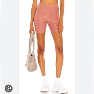 Twenty Montreal rose colored bike shorts by Anthropologie